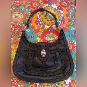 Isabella Fiore black leather handbag.